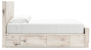 Signature Design by Ashley Lawroy panel storage bed with built-in drawers and modern wood finish, showcasing its sleek design and storage features.