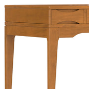 Handcrafted Simpli-Home Harper writing desk with a smooth wooden surface and sturdy legs, ideal for home office or study space.