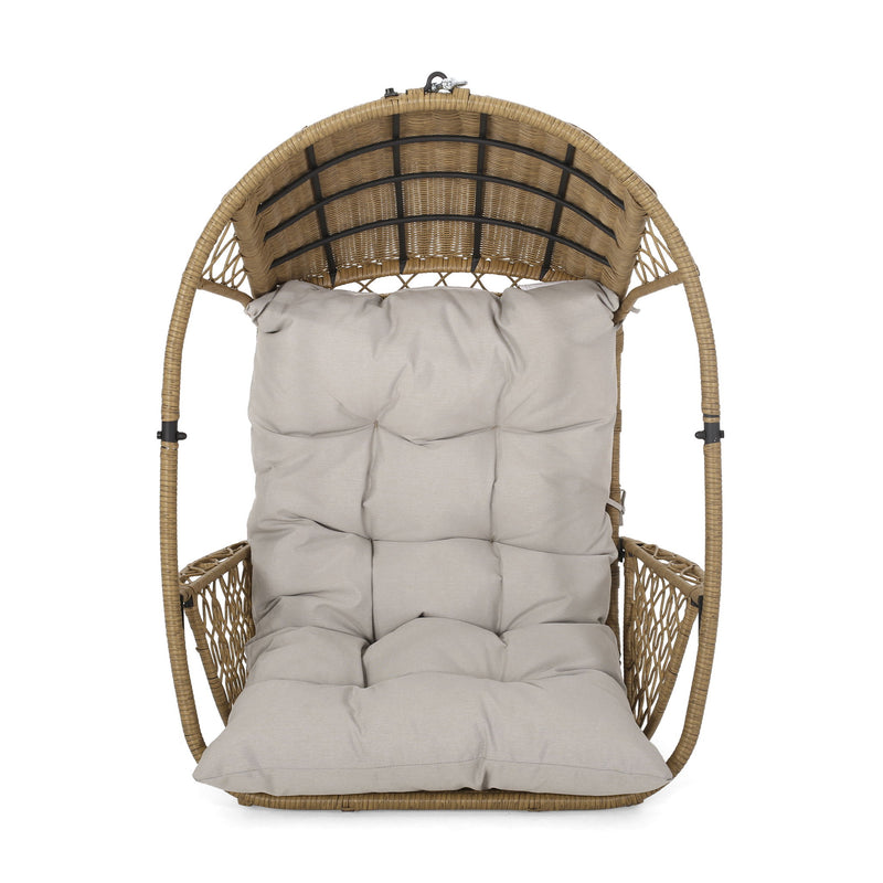 Light brown wicker hanging chair with beige cushions and 8-foot chain, ideal for outdoor or indoor relaxation by Noble House.