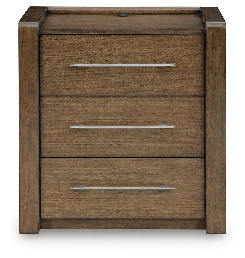 Brown Marxmore nightstand with three drawers and built-in charging station, made by Benchcraft® for convenient bedside storage.
