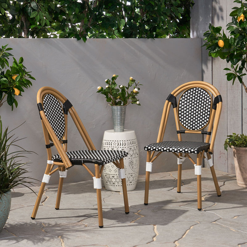 Noble House outdoor rattan and aluminum French bistro chair set with woven seats and curved backs, perfect for patio dining.