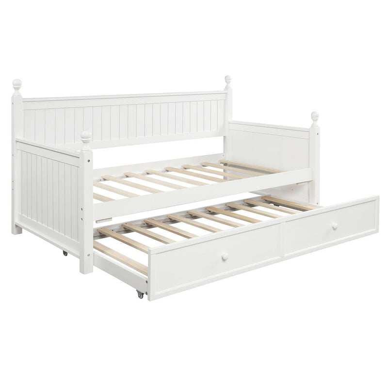 White twin size daybed with integrated trundle bed from DreamHaus, showcasing a modern design with clean lines and a sturdy frame.