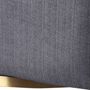 Dark gray Uttermost Cuthbert modern swivel chair with a sleek, rounded design and metal base, suitable for contemporary interiors.