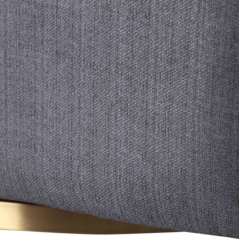 Dark gray Uttermost Cuthbert modern swivel chair with a sleek, rounded design and metal base, suitable for contemporary interiors.