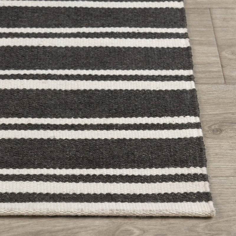Classic Home Palma Stripe Rug featuring a bold striped pattern, perfect for adding style to living rooms or bedrooms.