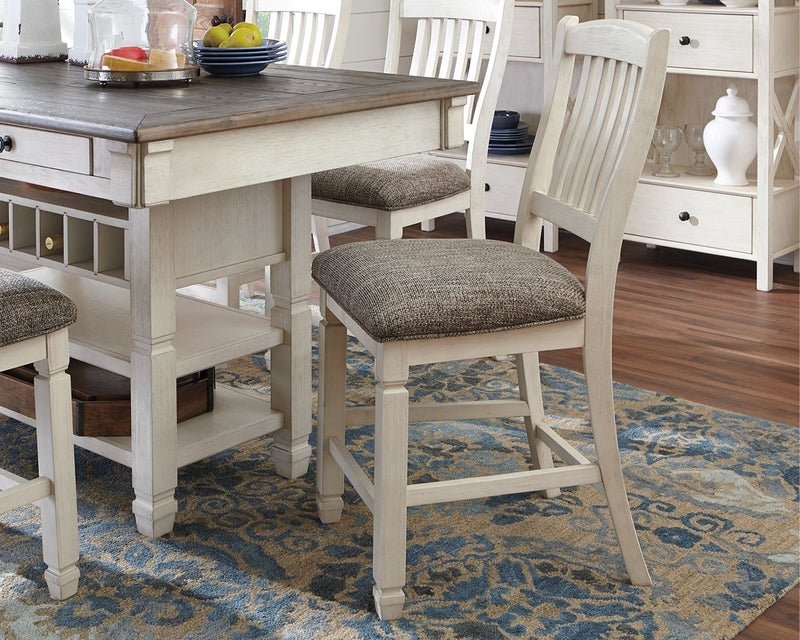 Set of two beige upholstered barstools from Signature Design by Ashley, featuring padded seats and modern design for kitchen or bar areas.