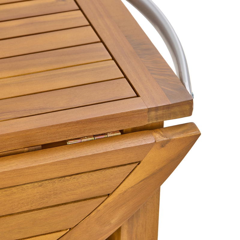 Outdoor teak bar cart with foldable tabletop and removable trays, ideal for outdoor entertaining and storage.