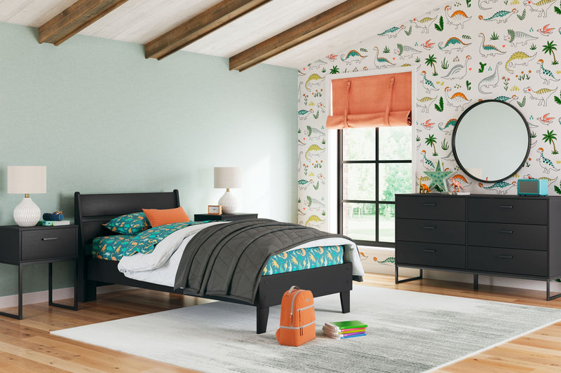 Signature Design by Ashley Socalle 3-piece bedroom set with bed frame, dresser, and nightstand in a modern bedroom.