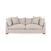 Classic Home Audrey stationary sofa with plush upholstery and elegant design, shown in a cozy living room setting.