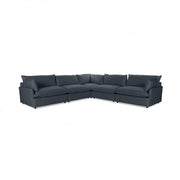 Classic Home Caplan modular sectional sofa with neutral fabric, showcasing its spacious, contemporary stationary sectional design.