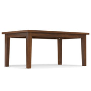 Simpli-Home Eastwood handcrafted dining table with wooden surface and sturdy legs, perfect for modern dining rooms.