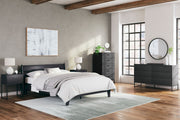 Signature Design by Ashley Socalle 3-piece bedroom set with bed frame, dresser, and nightstands in a modern bedroom setting.