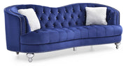 Glory Furniture Jewel stationary sofa with plush cushions and modern design, beige fabric upholstery, and wooden leg accents.