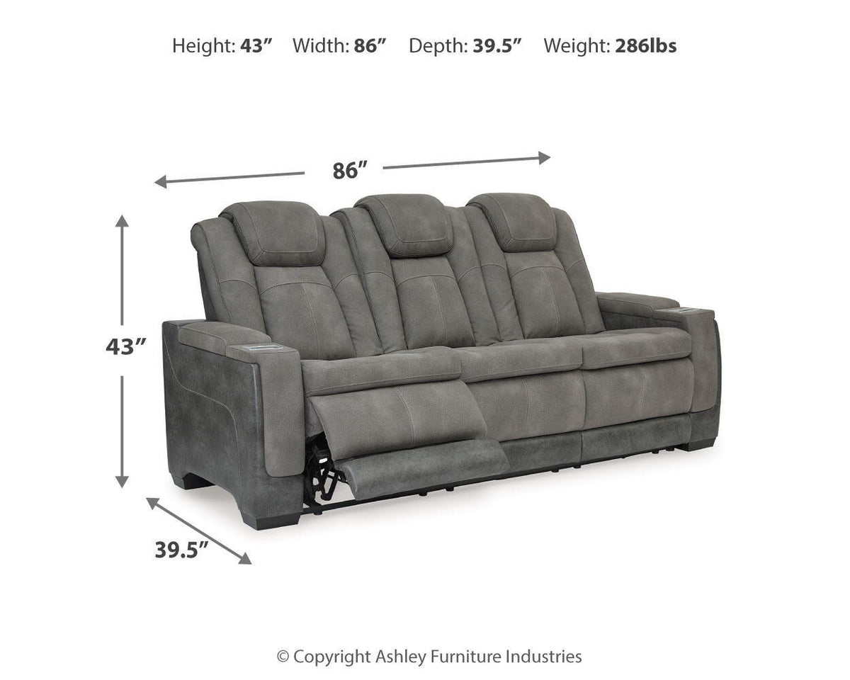 Signature Design by Ashley Durapella power reclining sofa with plush cushions and sleek fabric upholstery.