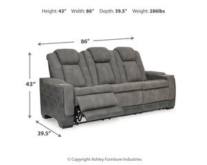 Signature Design by Ashley Durapella power reclining sofa with plush cushions and sleek fabric upholstery.