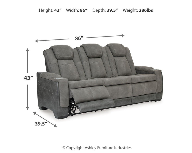 Signature Design by Ashley Durapella power reclining sofa with plush cushions and sleek fabric upholstery.