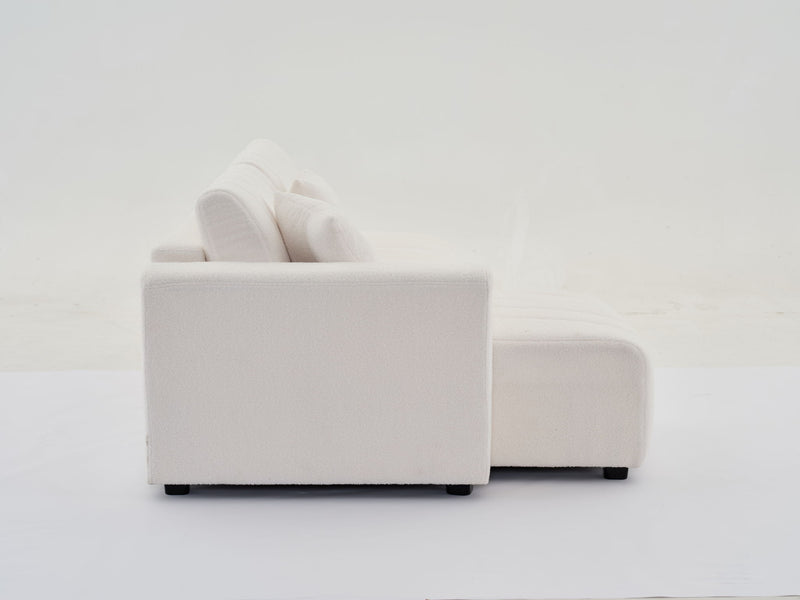 Urban Retreats Jessica lamb wool sectional sofa with chaise, versatile stationary sectional in a modern living room setting.