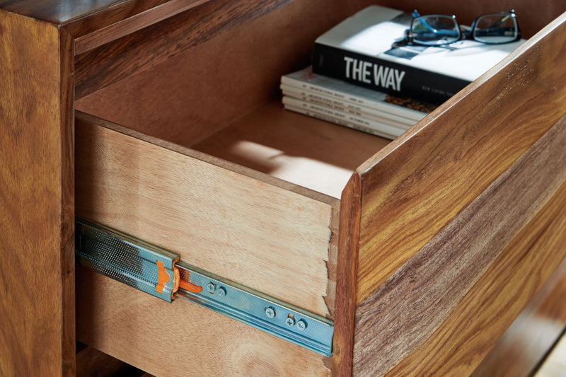 Dressonni - Five Drawer Chest - Brown - R&R Furniture Gallery (Fountain Valley, CA)