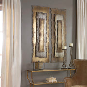 Uttermost Jaymes oxidized gold wall decor panel with intricate metal design for modern interior decoration.