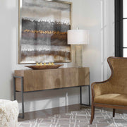 Contemporary Nevis console table by Uttermost with light brown wooden finish and sleek modern design.