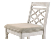 Pair of Lilola Home Havanna wide chairs with off-white cushions, featuring wooden frame and comfortable seating.