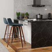 Set of two Simpli-Home Randolph Bentwood bar height stools with wooden seats and metal legs for counter or bar seating.