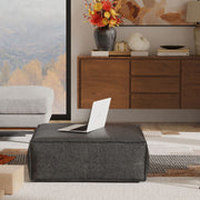 Large square Brody coffee table pouf by Simpli-Home, versatile accent pouf with soft fabric upholstery and modern design.
