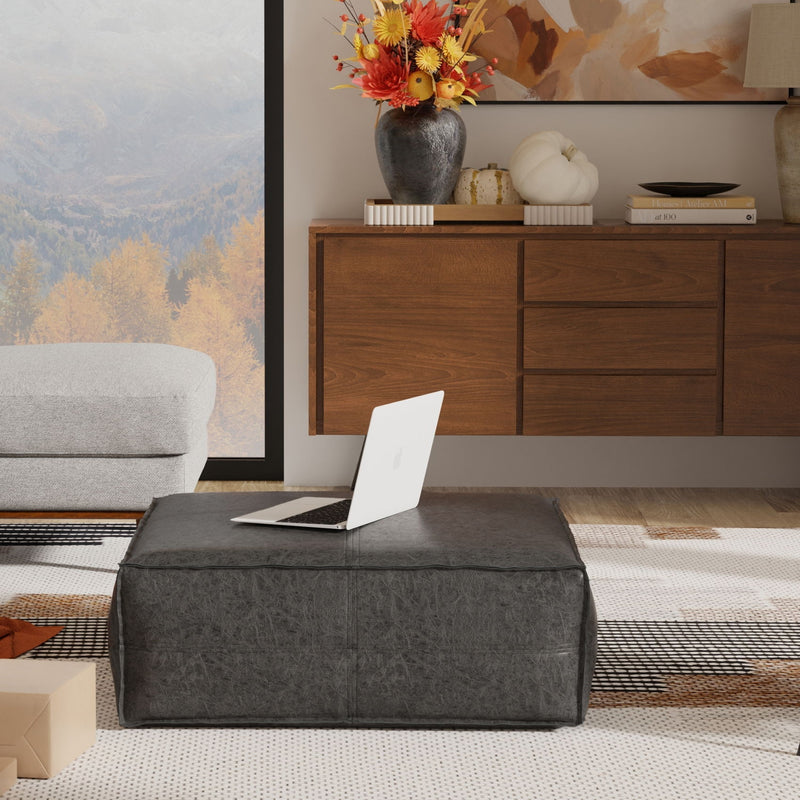 Large square Brody coffee table pouf by Simpli-Home, versatile accent pouf with soft fabric upholstery and modern design.