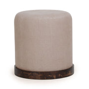 TOV Furniture Como Burl and Cotton Jute Accent Stool in peach with a rounded design and textured fabric surface.