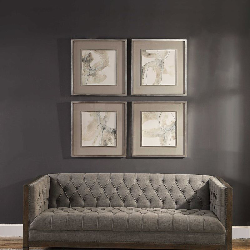 Set of four beige framed prints featuring abstract divination art by Uttermost, displayed on a neutral background.