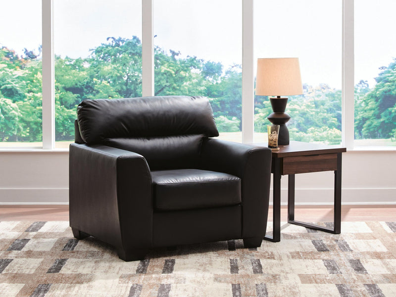 Midnight Glennbre arm chair by Signature Design by Ashley® featuring plush upholstery and sleek design for modern living spaces.