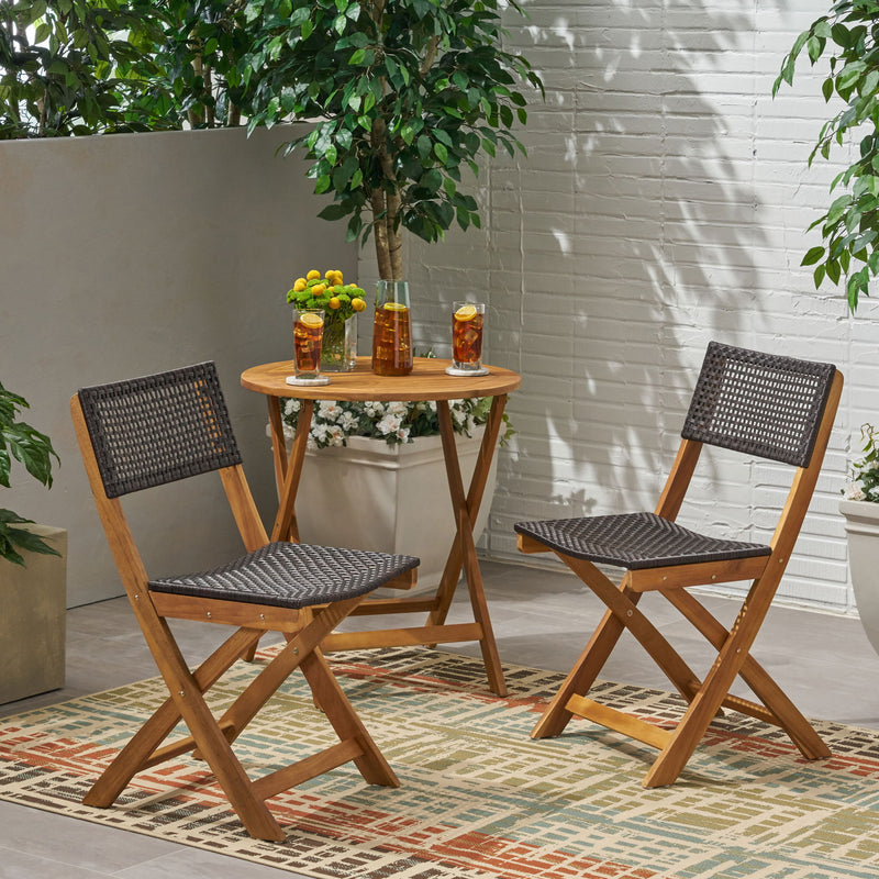 Noble House Bistro foldable armless chair with wicker backrest, lightweight and stylish for outdoor or indoor use.