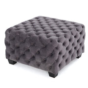 Noble House modern glam upholstered ottoman with button tufted design and plush fabric, serving as stylish home decor or footrest.