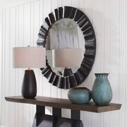 Black Caribou Round Accent Mirror by Uttermost with a sleek, modern design and a smooth black finish.