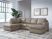 Signature Design by Ashley® Amuleto stationary sectional sofa with plush cushions and modern design in a spacious living room setting.