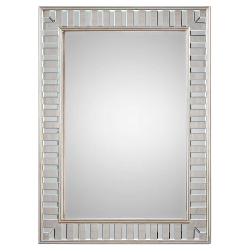 Silver leaf wall mirror by Uttermost, featuring a decorative leaf frame for elegant home décor.
