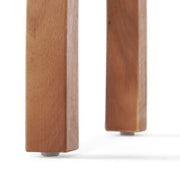 Noble House Kinesis outdoor side table with slatted top and wood frame, ideal for patio or garden seating areas.