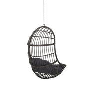 Rustic Noble House hanging basket chair with cushion, ideal for indoor or outdoor lounging and relaxation.