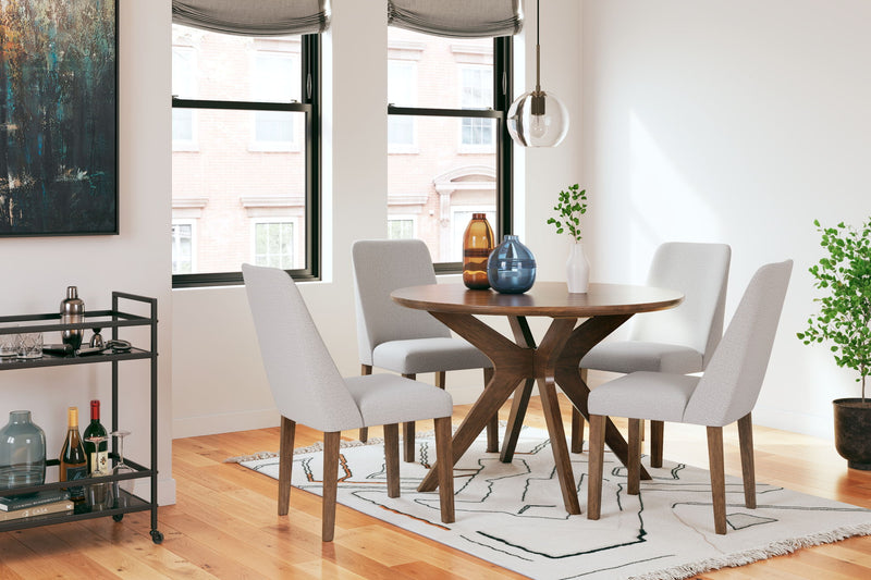 Signature Design by Ashley 5-piece dining room table set with wooden table and matching chairs, modern and stylish for dining spaces.