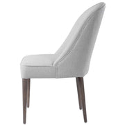 Set of two Uttermost Brie armless chairs with modern design, upholstered in light fabric, featuring sleek metal legs.