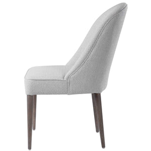 Set of two Uttermost Brie armless chairs with modern design, upholstered in light fabric, featuring sleek metal legs.