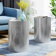 Modern round accent table by Noble House with a hammered surface finish, perfect for stylish living room decor.