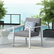 Modern Noble House lounge arm chair with rope accents and plush cushions, featuring stylish and comfortable seating design.