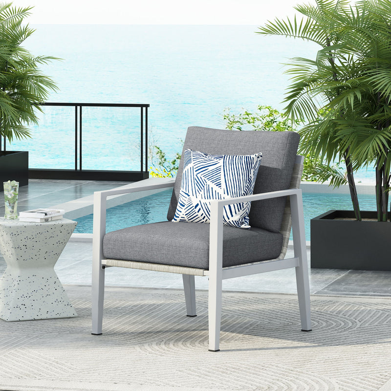 Modern Noble House lounge arm chair with rope accents and plush cushions, featuring stylish and comfortable seating design.