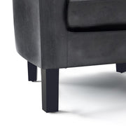 Handcrafted Austin arm chair by Simpli-Home featuring a plush fabric upholstery and wooden legs.