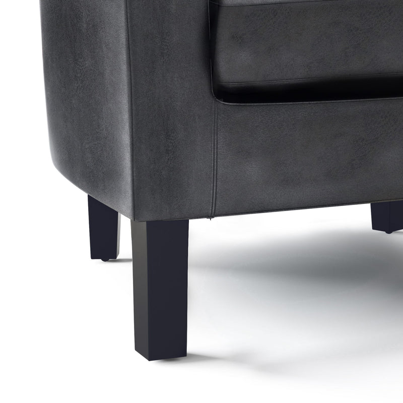 Handcrafted Austin arm chair by Simpli-Home featuring a plush fabric upholstery and wooden legs.