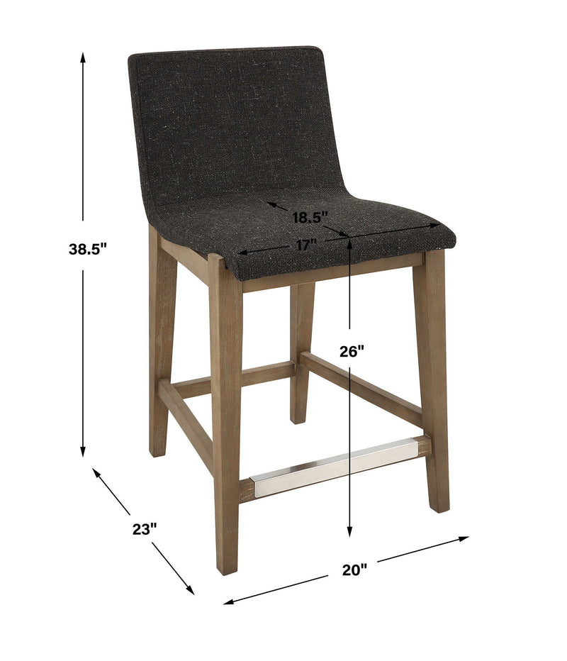 Uttermost Klemens counter stool with wooden seat and black metal frame, designed for counter height 24-27 inches.