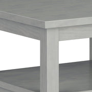 Handcrafted Warm Shaker coffee table by Simpli-Home featuring a natural wood finish and sturdy wooden legs.