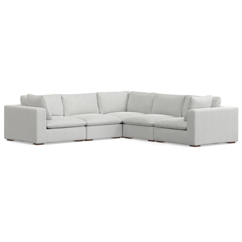 Handcrafted Jasmine sectional sofa by Simpli-Home featuring plush cushions and a modern stationary design in a cozy living room setting.
