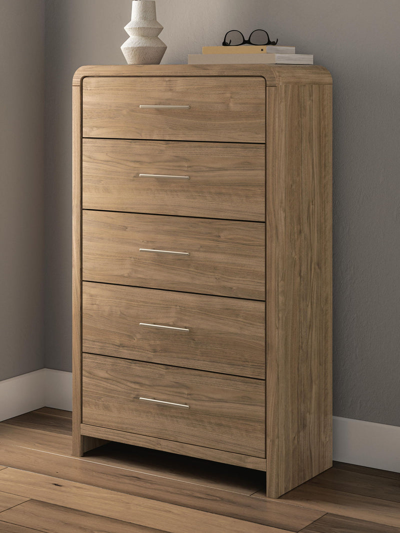 Signature Design by Ashley® Gramburg five drawer chest in warm natural brown wood with sleek accent chest design.